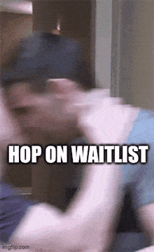 a blurred image of a man with the words `` hop on waitlist '' written on it .