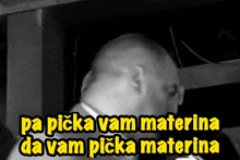 a black and white photo of a man with the words pa picka vam materna da vam picka materna in yellow letters