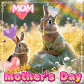 a mother 's day card with two rabbits and the word mom
