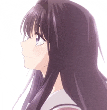 a close up of a girl 's face with purple hair and blue eyes