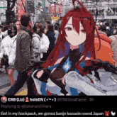 a woman with red hair is standing in a crowd of people