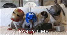 a group of pug dogs dressed up as captain america , iron man , and a hammer .