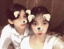 a boy and a girl with a dog mask on their face