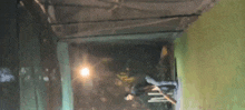 a blurry photo of a person standing in a dark room