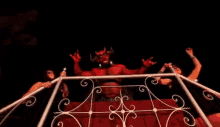El Diablo Rapeando GIF - Cartel De Santa Diablo Perreando GIFs