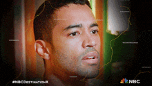 a man 's face is shown in a nbc destination x poster