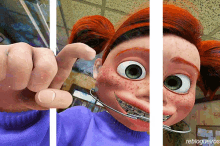 a picture of a cartoon character with freckles and braces on her face