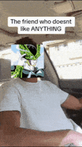 a man driving a car with a picture of a cell on his face