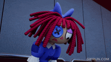 a doll with red hair and a blue bow has a blue button on her eye