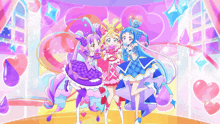 three anime girls are standing next to each other in front of a colorful background
