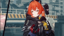 a girl with red hair is wearing a black and yellow jacket