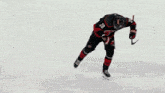 a hockey player with the number 20 on his jersey is skating on the ice