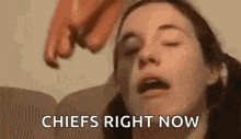 a close up of a woman 's face with the words `` chiefs right now '' written above her .