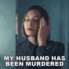 a woman is looking at herself in a mirror with the words " my husband has been murdered " above her