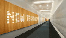a long hallway with the word new technology written on the wall