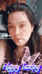 a woman 's face with a butterfly and the words happy tasking