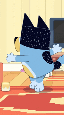 a cartoon dog is dancing in a living room
