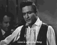 Johnny Cash Love Is A Burning Thing GIF - Johnny Cash Love Is A Burning Thing Playing Guitar GIFs