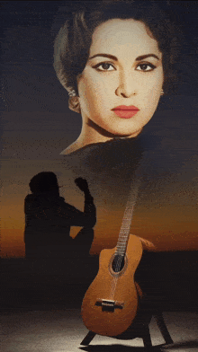 a painting of a woman and a guitar on display