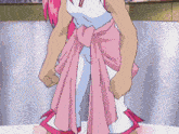 a girl with pink hair is wearing a white shirt and a pink skirt