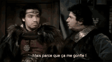 two men are standing next to each other and one of them says mais parce que ca me gonfle !