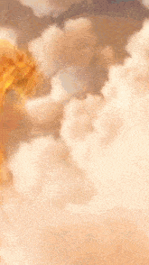 a golden dragon is flying through a cloudy sky .