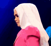 siti nurhaliza flip hair flip hijab pink white