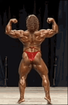Female Muscle Flex GIF - Female Muscle Flex Biceps - Discover