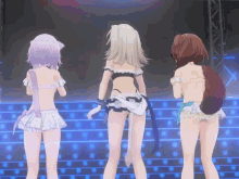 three anime girls are standing on a stage and one of them has a tail