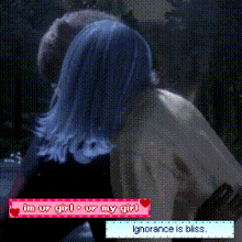 a woman with blue hair is kissing a man with a sticker that says ' ignorance is bliss '