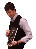a man in a vest is holding a book that says ' sherlock holmes ' on the front