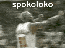 a blurred image of a basketball player with the word spokoloko written above him