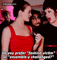 a woman in a red dress is talking to two other women and says do you prefer fashion victim or ensemble - y challenged ?