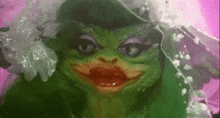 a close up of a frog wearing a wedding dress and veil with red lips .