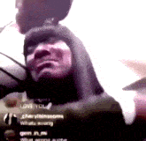 a woman 's face is shown in a blurry photo with the words " love you " written on the bottom