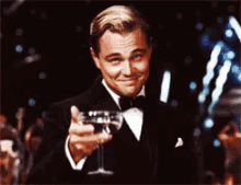Cheers GIF - Great Gatsby Cheers Leonardo Di Caprio GIFs