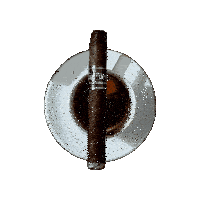 a cup of coffee with a coffin cigar in it