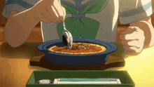 a person is eating a meal with a spoon