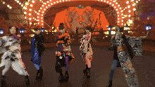 a group of women are dancing in front of a spider web
