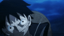 a close up of a cartoon character 's face with a blue background