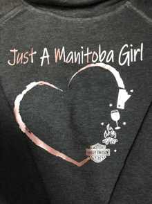 a shirt that says just a manitoba girl with a heart