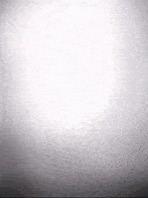 a gray background with a white circle in the middle .