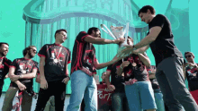 Winners Clapping GIF - Winners Clapping Trophy GIFs