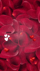 a bunch of hearts are floating in the air