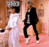 a man and a woman are dancing in a room with v103 written on the top