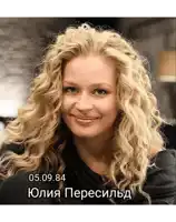 a picture of a woman with curly hair and the date 05.09.1984
