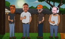 four men are standing in front of a wooden fence with one wearing an orange hat
