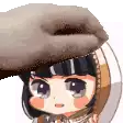 a cartoon girl with a hat on her head is being propped up by a hand .