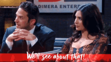 a man and woman are sitting in front of a sign that says dimera enterpr