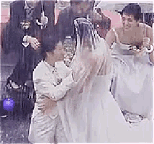 it started with a kiss wedding rain couple swapped dresses